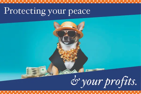 A small dog wearing sunglasses, a gold hat, and gold frill necklace surrounded by stacks of money.